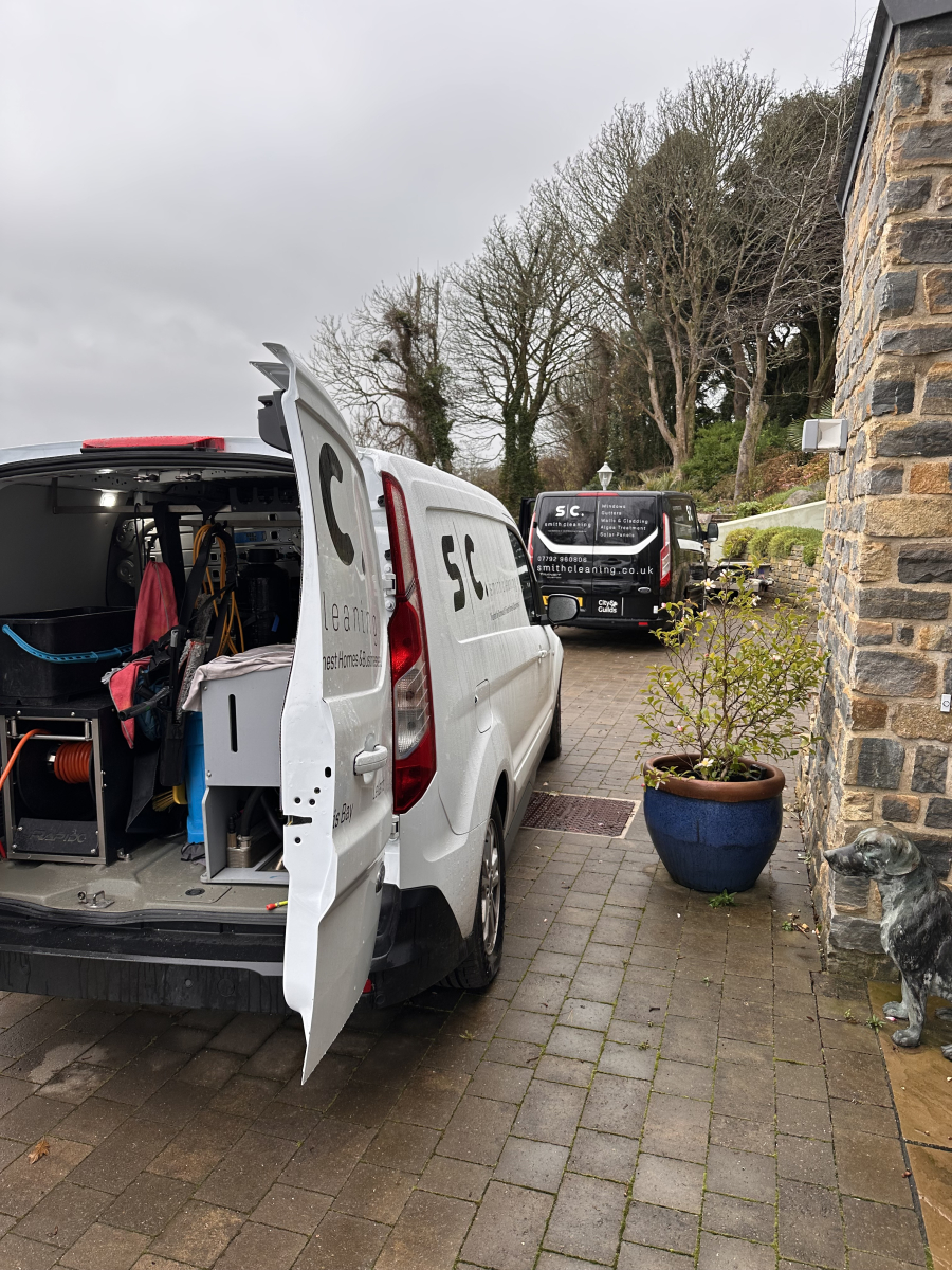 Professional window cleaning vans and uniform